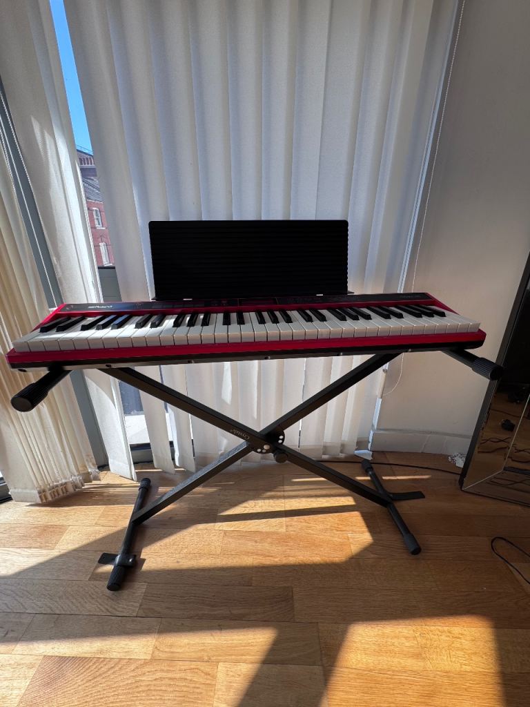 Roland GO:KEYS 61-Key Keyboard Bundle with Stand, Music Rest, Manual + Songbook