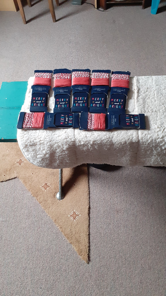 10 packs of Xmas Gift Tags and Ribbons. All still in packs  new.