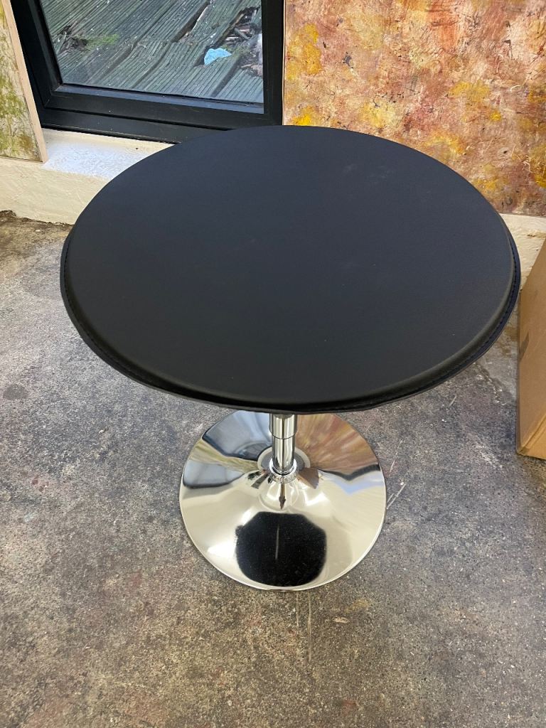 Round table with black top