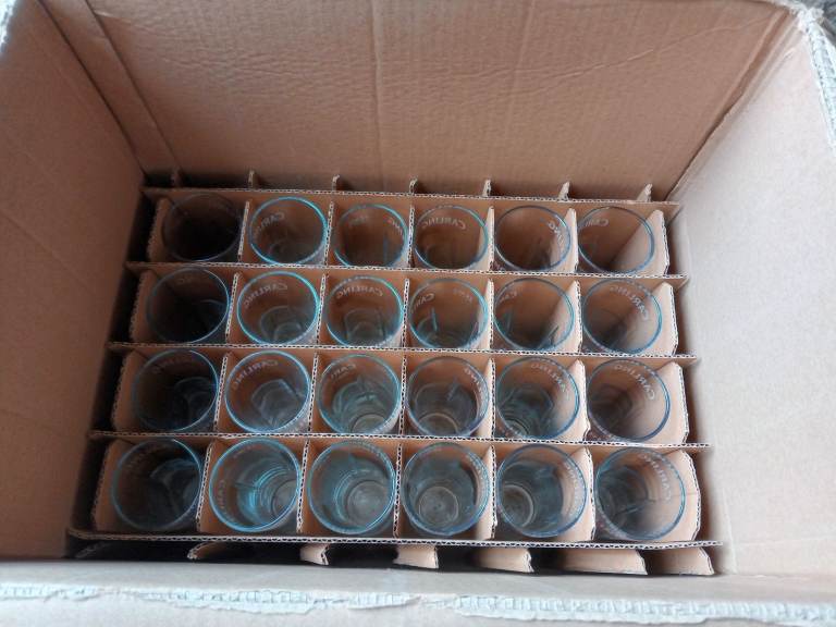 24 half pint Carling pub glasses never used.