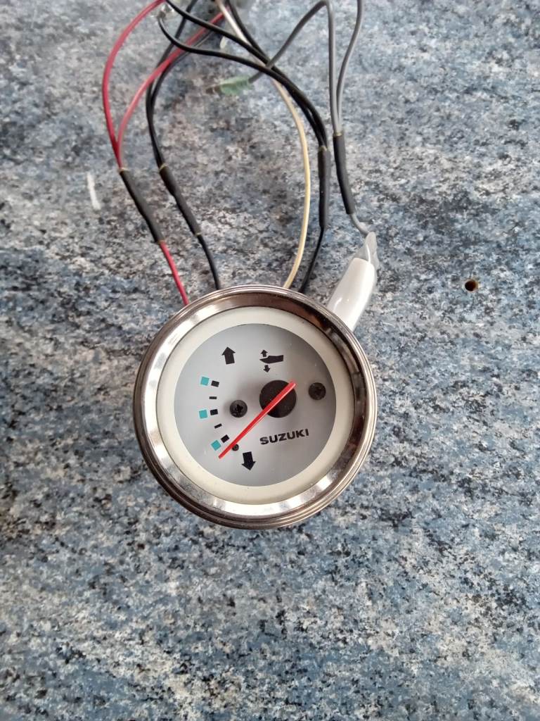 Suzuki powertrim guage.  New. 60mm diameter. For all DF engines