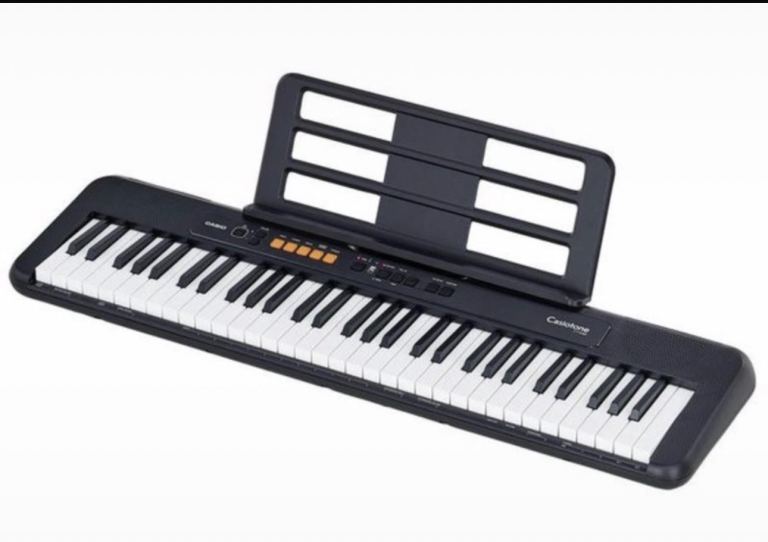 Casio CT-S100 Keyboard with Music Stand in Black.
