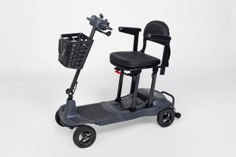 BRAND NEW. GENIE ULTRALIGHT FOLDING MOBILITY SCOOTER.  12 KG. AIRLINE FRIENDLY 