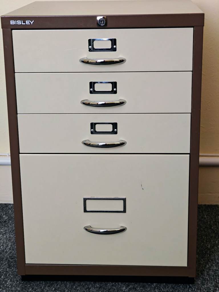 Metal filing and storage cabinet
