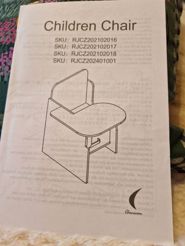 Childrens chair with attached table