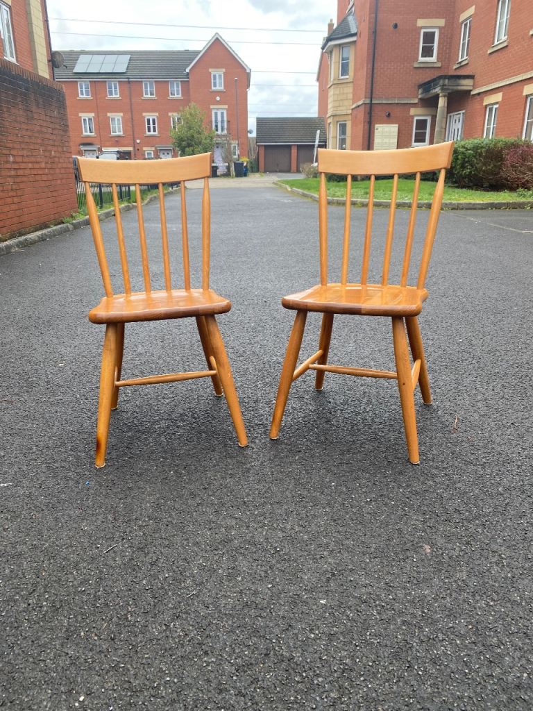 Pair of mid century stick back dining chairs (delivery available)