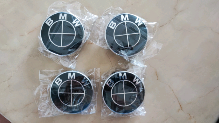 4x BMW wheel center caps 56mm all black.