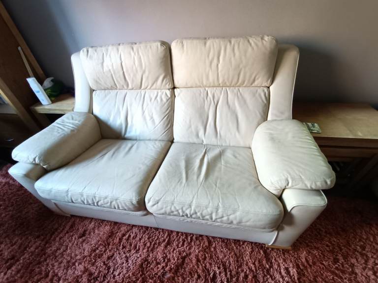 2 X 2 seater cream leather sofas
