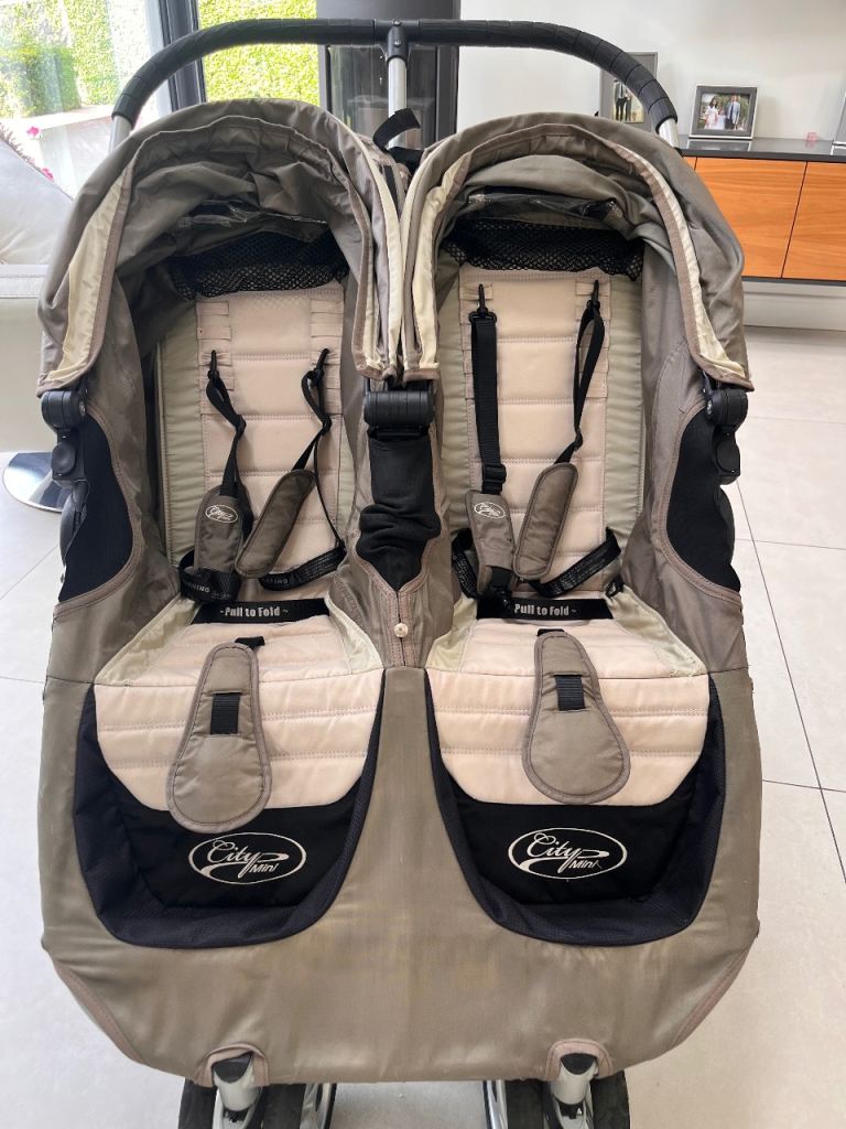 City Jogger double buggy with rain cover