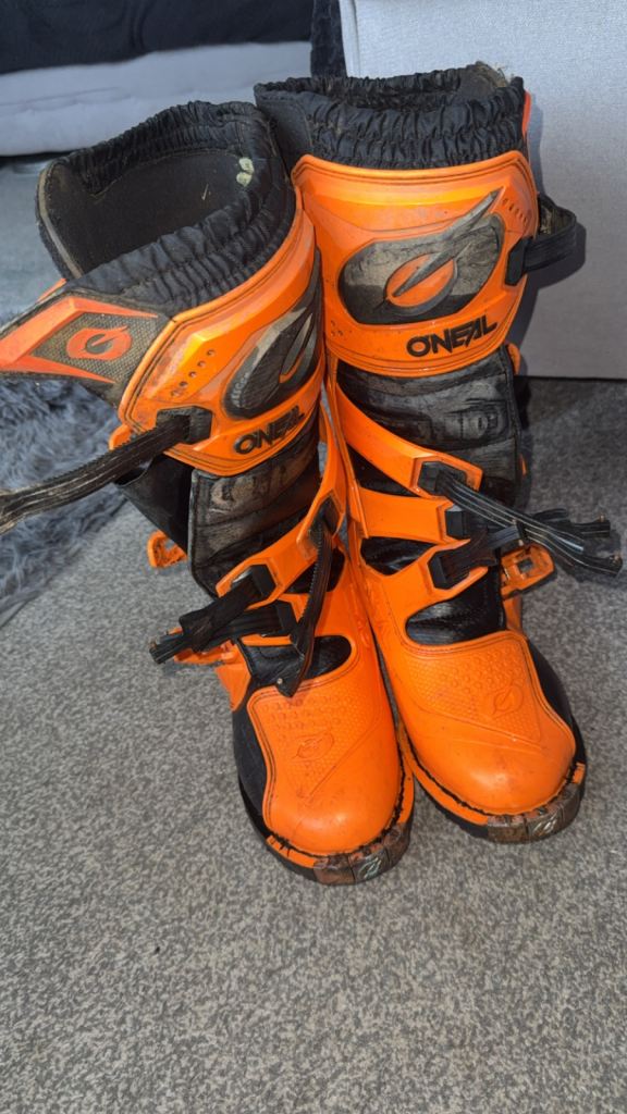Men’s and kids motorcross boots and helmet