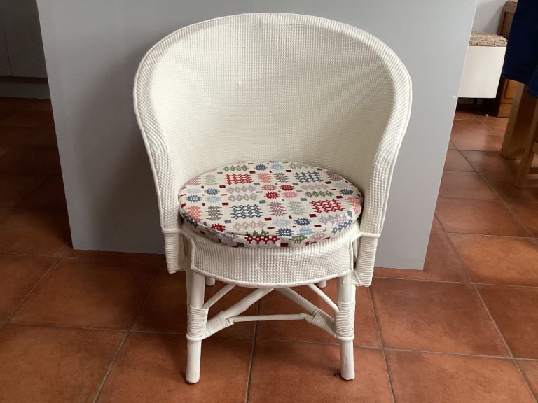 Pretty Lloyd loom chair with cushion