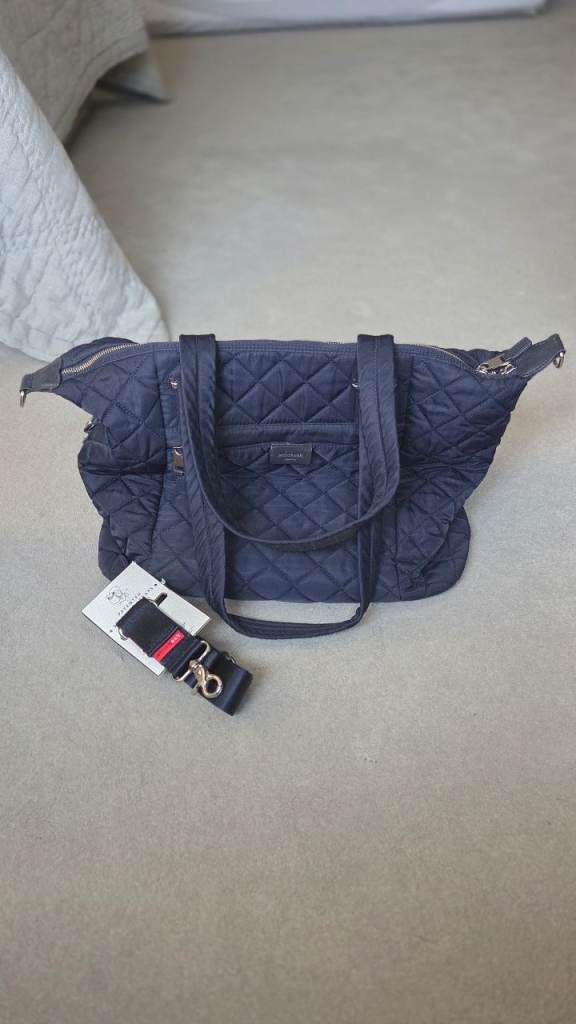 Storksak Navy quilted changing bag with shoulder/stroller strap