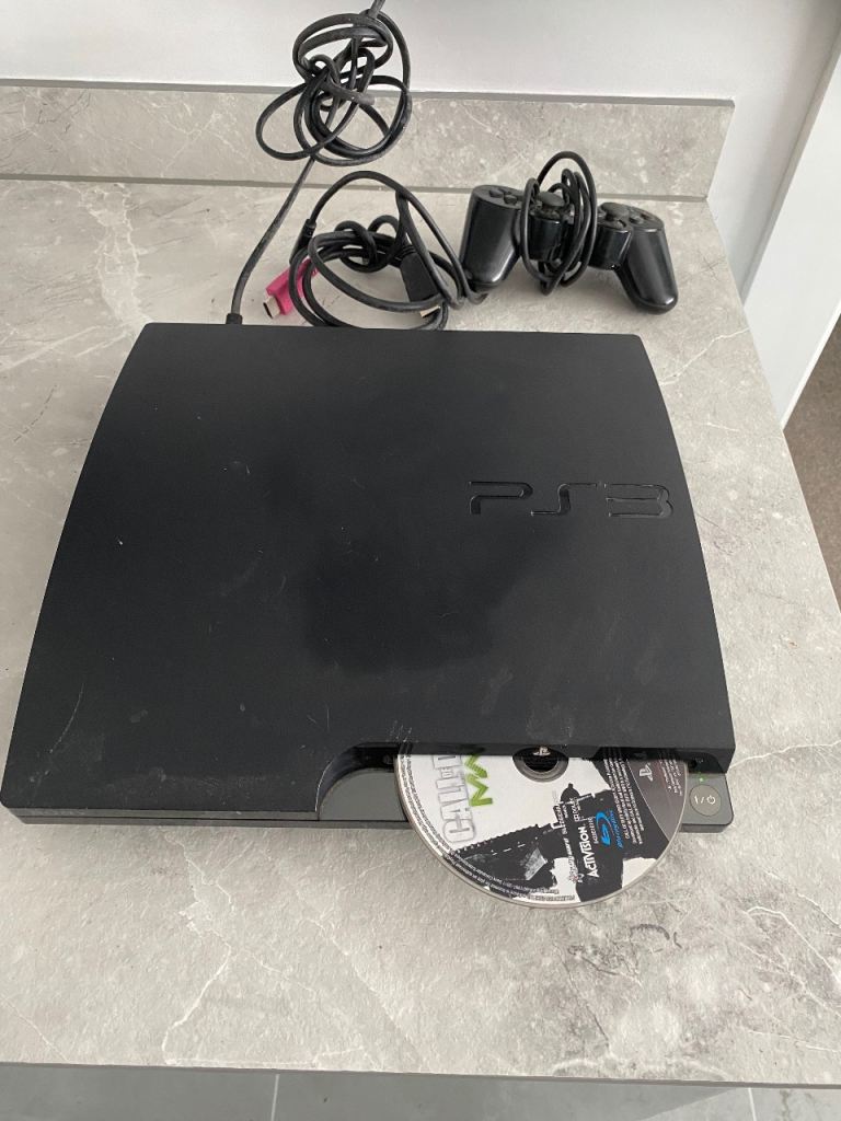 Sony PlayStation 3 Console with Controller and Cables