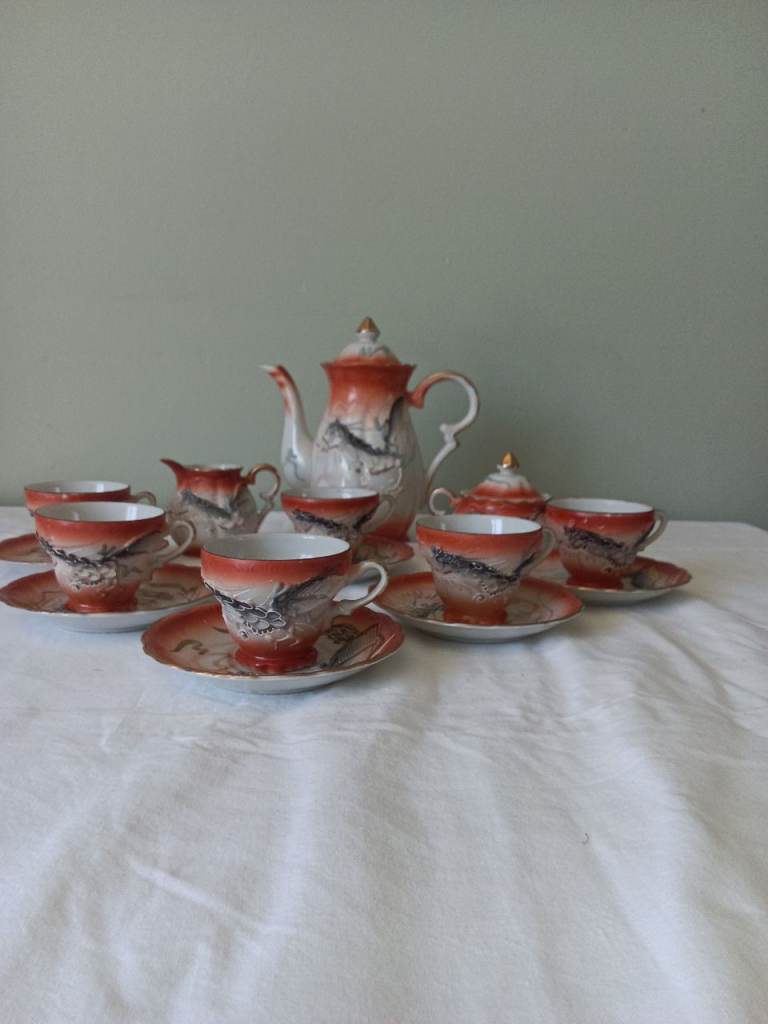 Orange embossed dragon coffee set