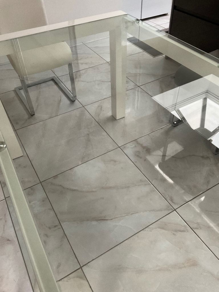 Glass Dining Table with White Legs – Good Condition