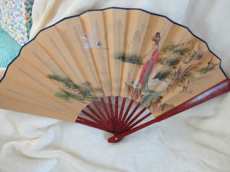 Vintage Hand Fan with Traditional Design