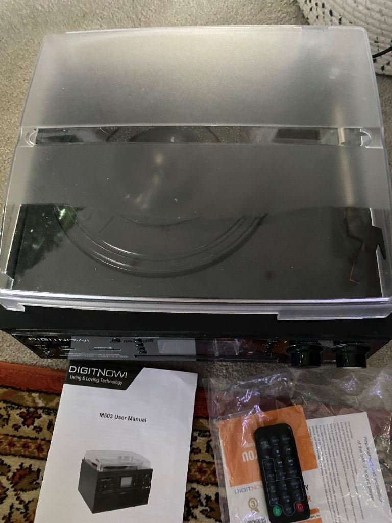 Digitnow M503 record player. Built in speaker/bluetooth/cd/radio/tape/usb. 