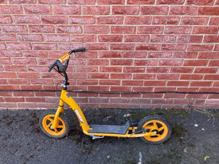 Booster Yellow Scooter with Large Wheels – Good Condition