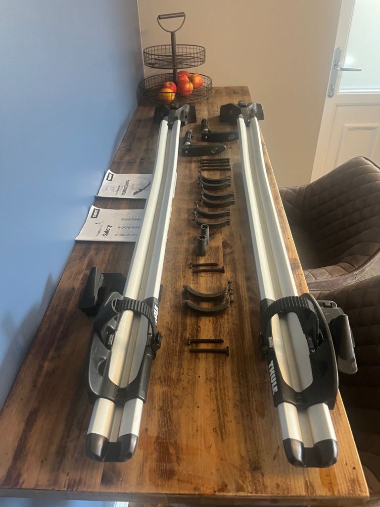 2 Thule Outride 561 cycle carriers. 