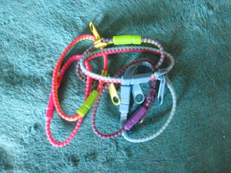 6 Ladies Plastic zip style bangles brand new