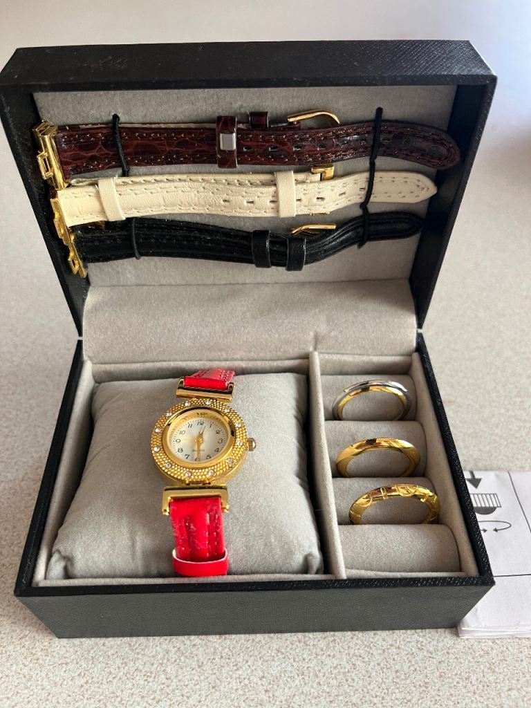 Ladies Gold Tone Watch with Interchangeable Straps and Rings