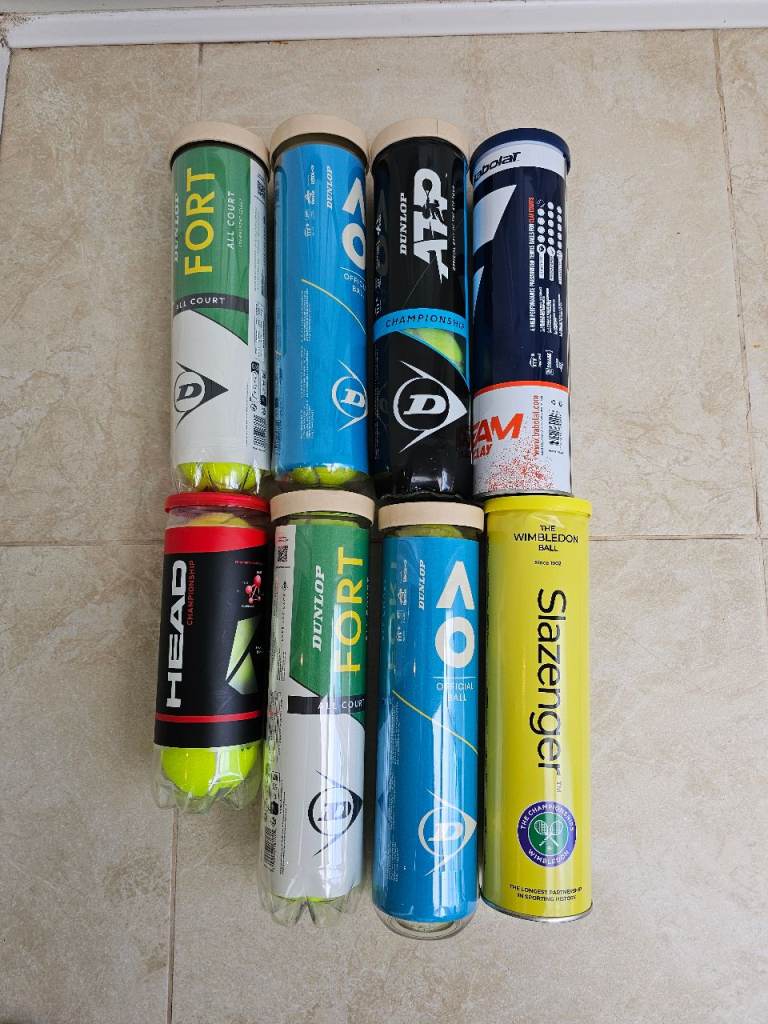 31 used tennis balls 