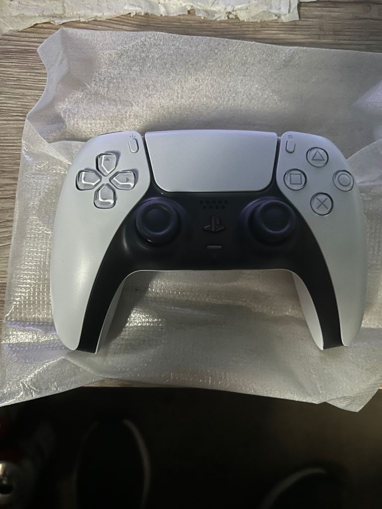 Brand new Ps5 white dual sense controller for sale.