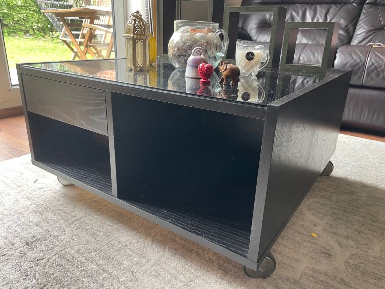 Black Wooden Coffee Table on Wheels with Glass Top