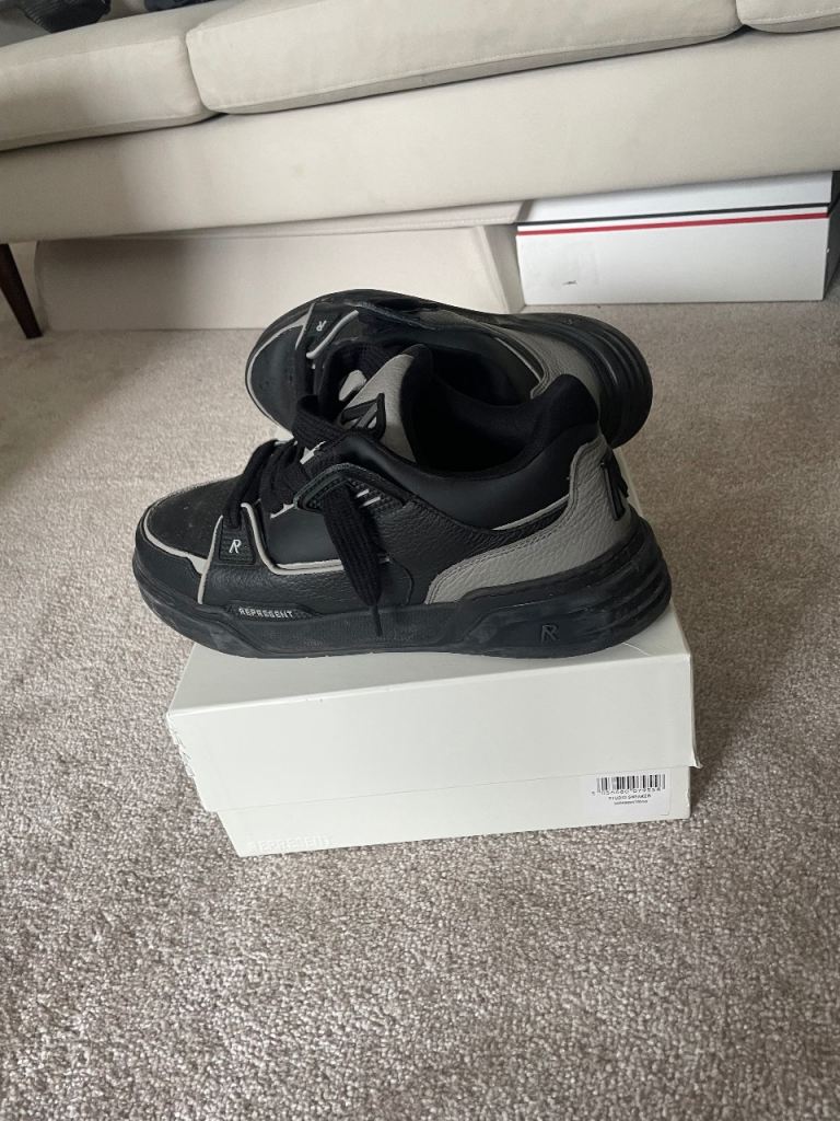 Represent black skater trainers