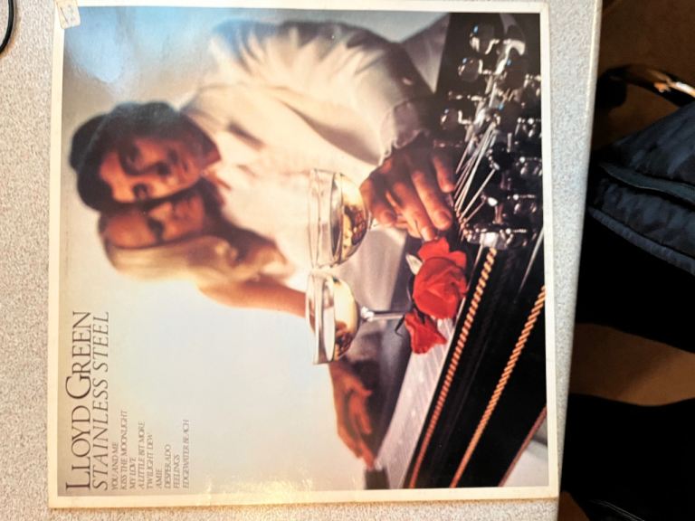 4 pedal steel LPs.  Lloyd Green 