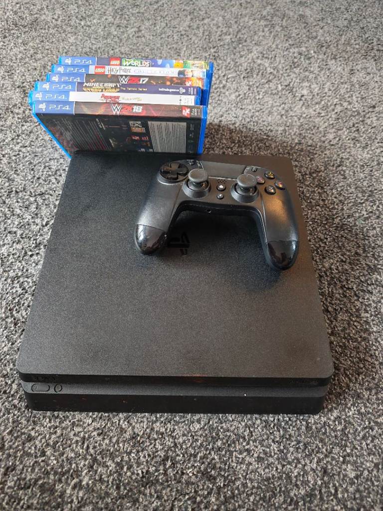 Sony PlayStation 4 Console with Controller and Games