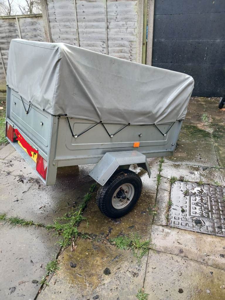 Small Erde car trailer with cover and frame