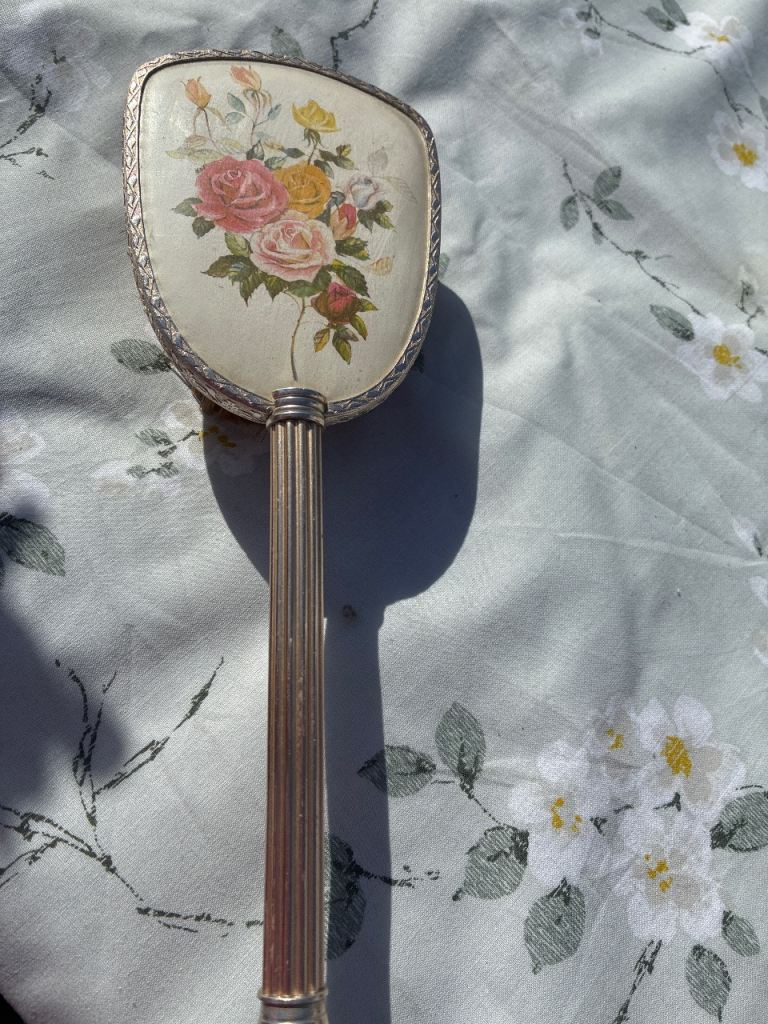 Vintage Handheld Mirror with Floral Design – Good Condition