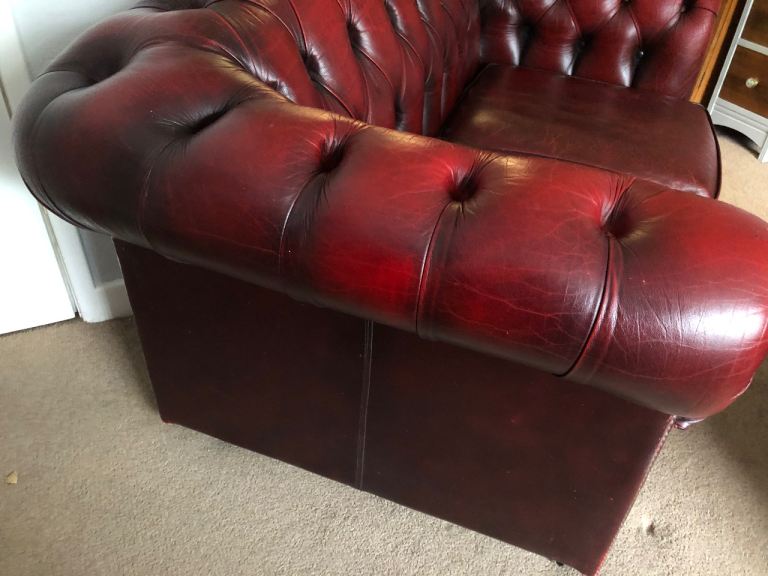 Vintage Oxblood 3 seater seater and foot stool to match 