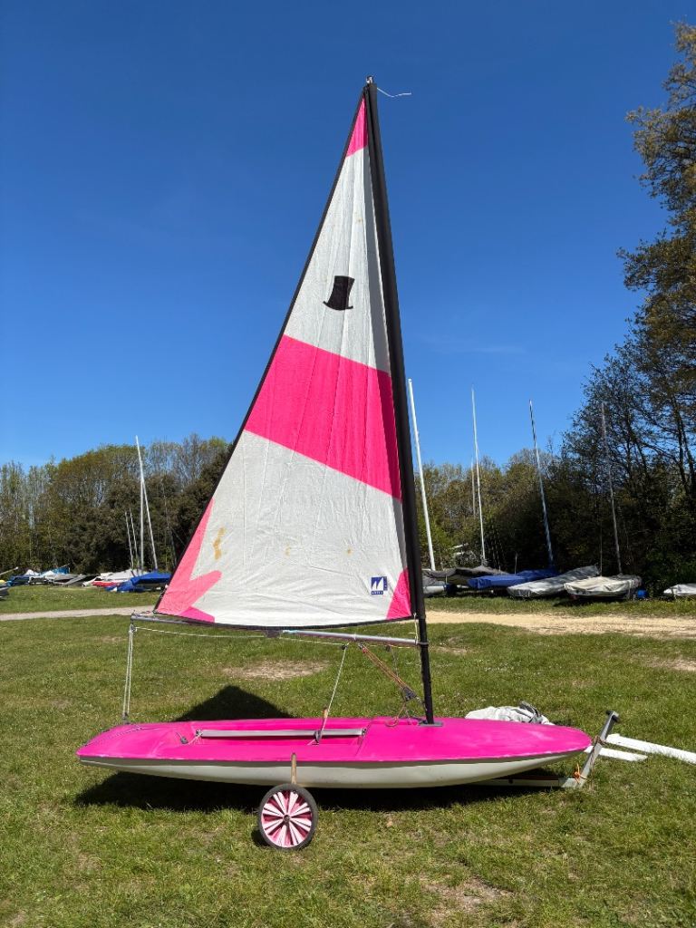 Pink Topper sailing racing dinghy boat 