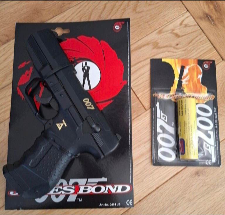 James Bond p99 ppk toy cap gun pistol with 1200 007 wicke paper caps will post very rare 