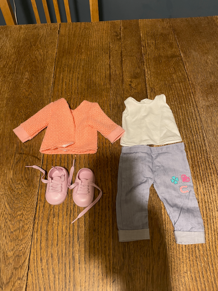 Collection of 15 Our Generation dolls outfits and accessories