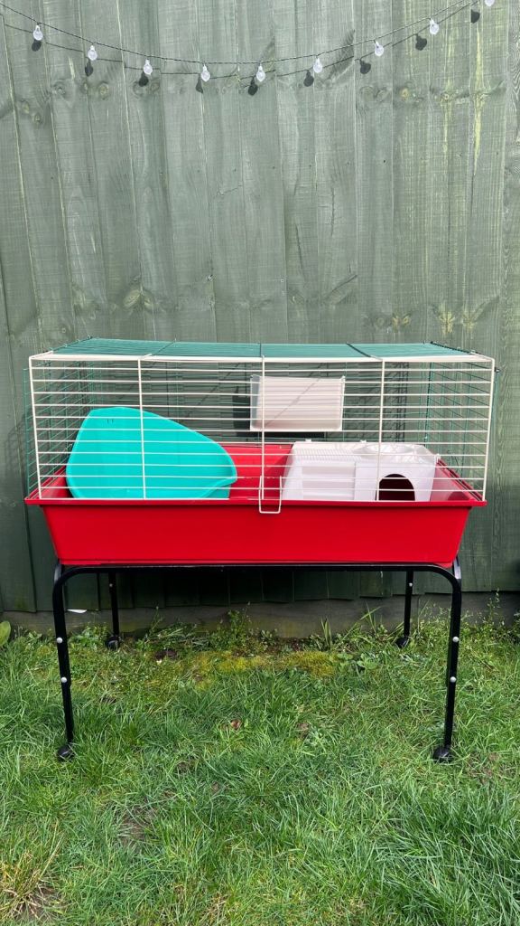 Small Animal Cage with Stand- Red- External Dimensions 95x57x45cm LxWxH- Used