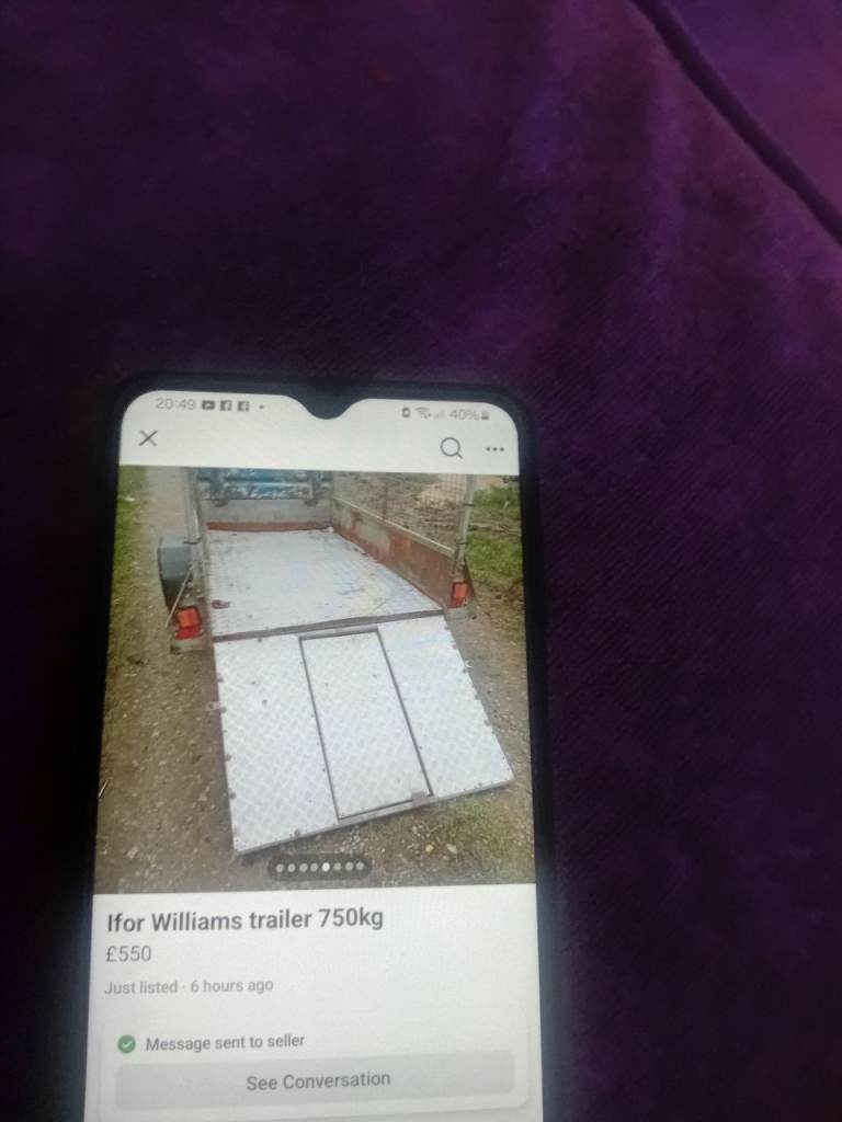 Drop tail lift trailer