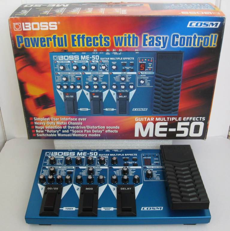 BOSS ME-50 guitar multi-effects pedal, boxed with a BOSS power supply and guitar lead