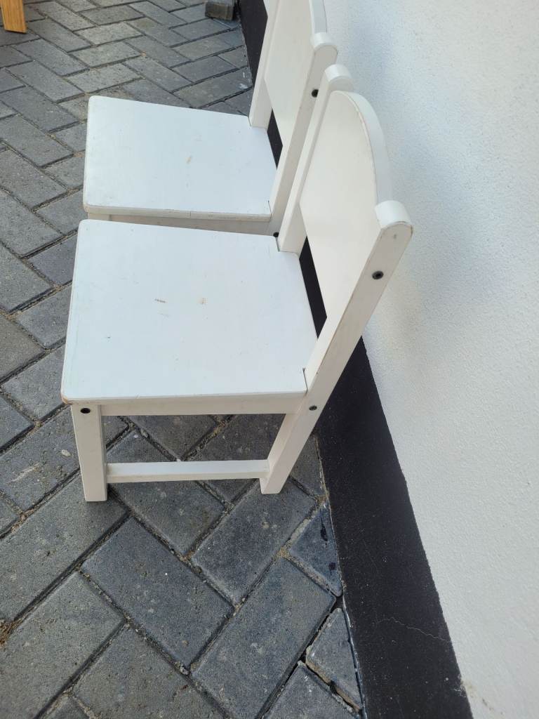 2 white Preschool Nursery school age wooden chairs