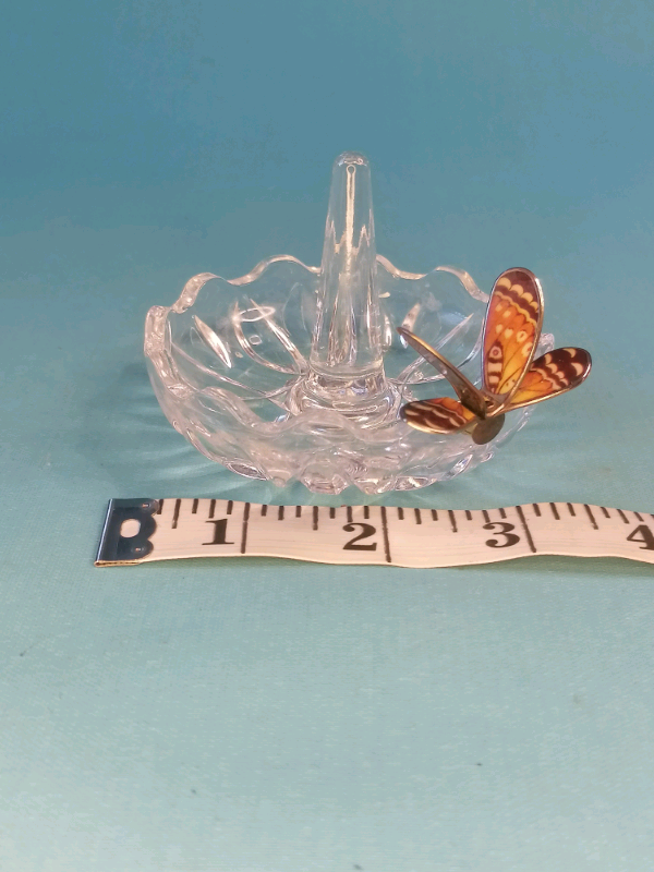 Glass ring holder with butterfly on  a side..
