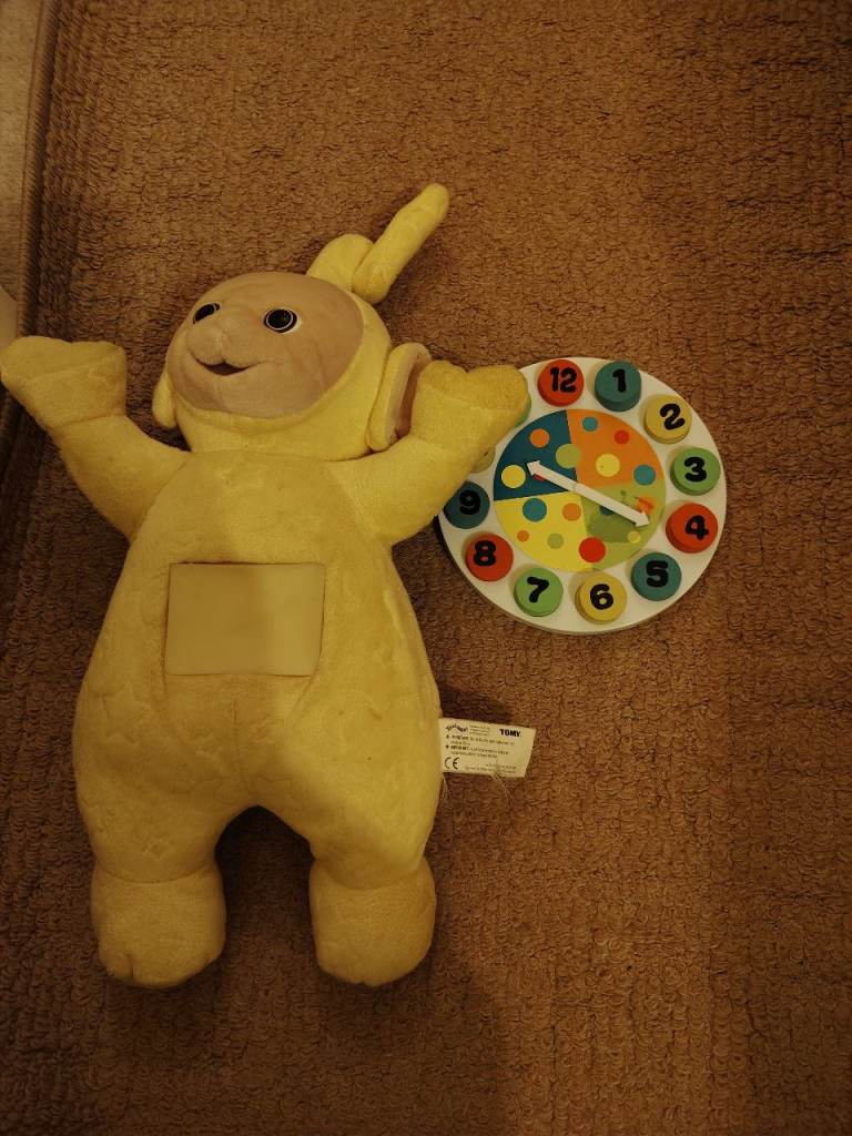 Teletubbie and clock