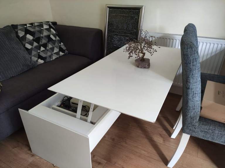 Gloss white coffee table cum dining table with storage