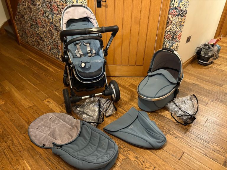 Egg pram, carrycot, both raincovers, furry liber and foot muff and stroller apron. 