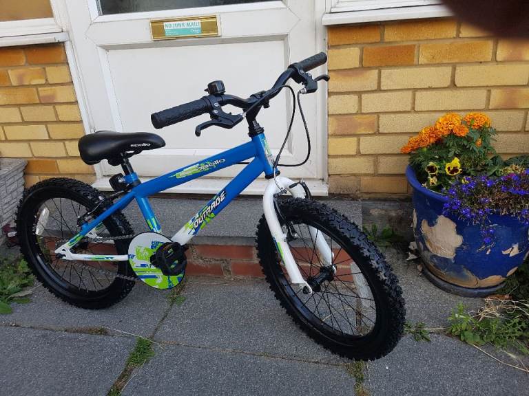 BOYS 18" WHEEL OUTRAGE BIKE IN GOOD WORKING CONDITION AGE 6+