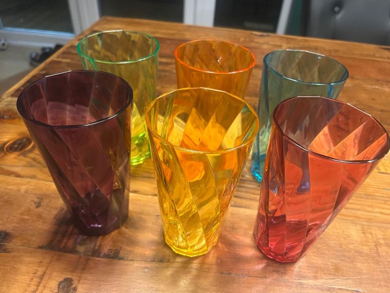 Set of 6 multicoloured plastic tumblers . Brand new in box . H16cm