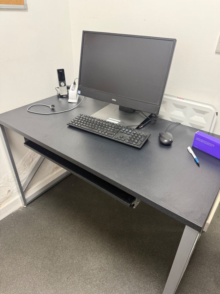 Black computer desk with pull out keyboard tray