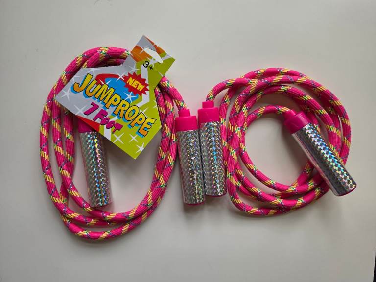 Two pink 7 foot jump ropes. New one with tag and one without. Never used