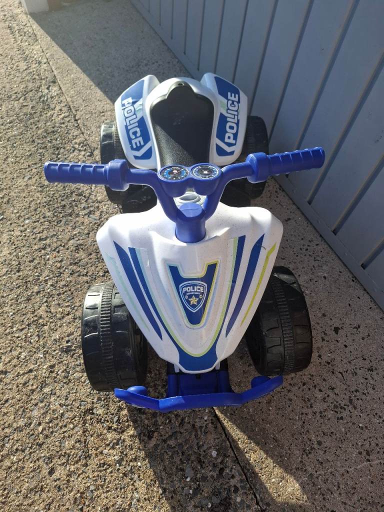 Kids Police Quad Ride-On Toy – White & Blue, Good Condition